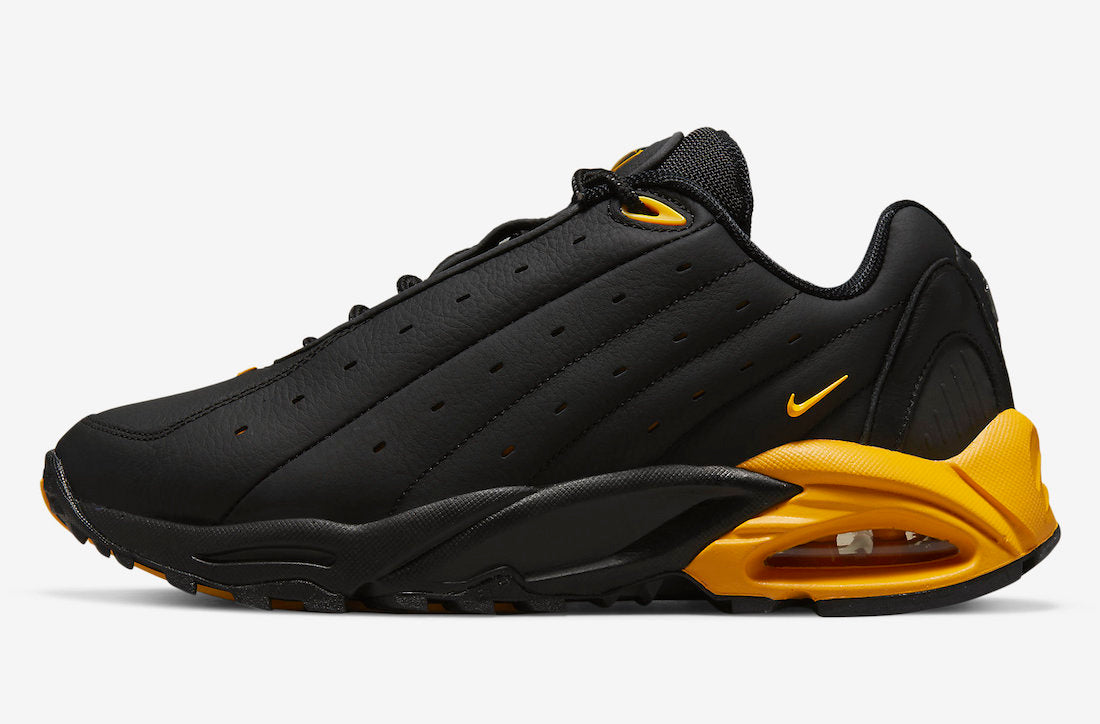 NOCTA x Nike Hot Step Air Terra “Black / University Gold”